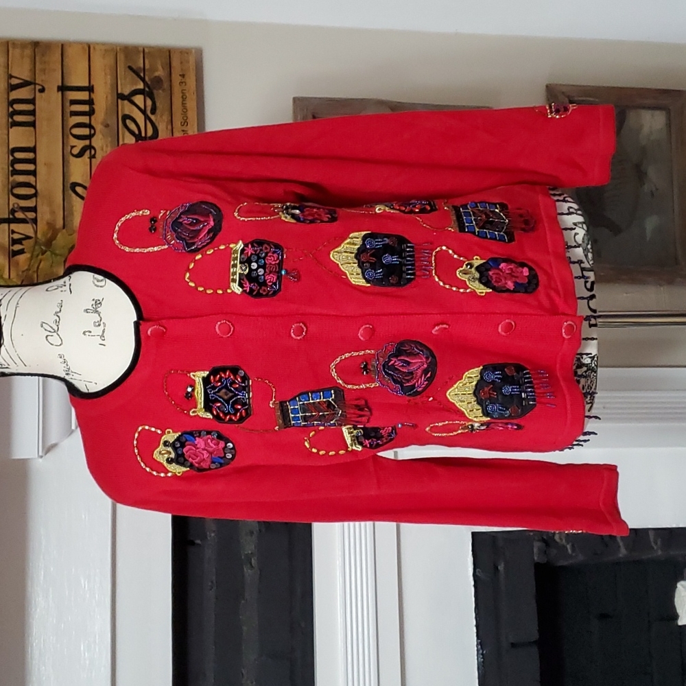 Beaded purse, red cardigan sweater